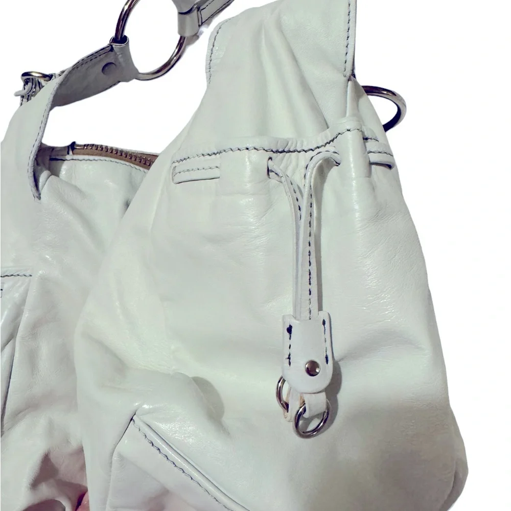 Vintage Miu Miu white leather hobo bag in excellent used condition.